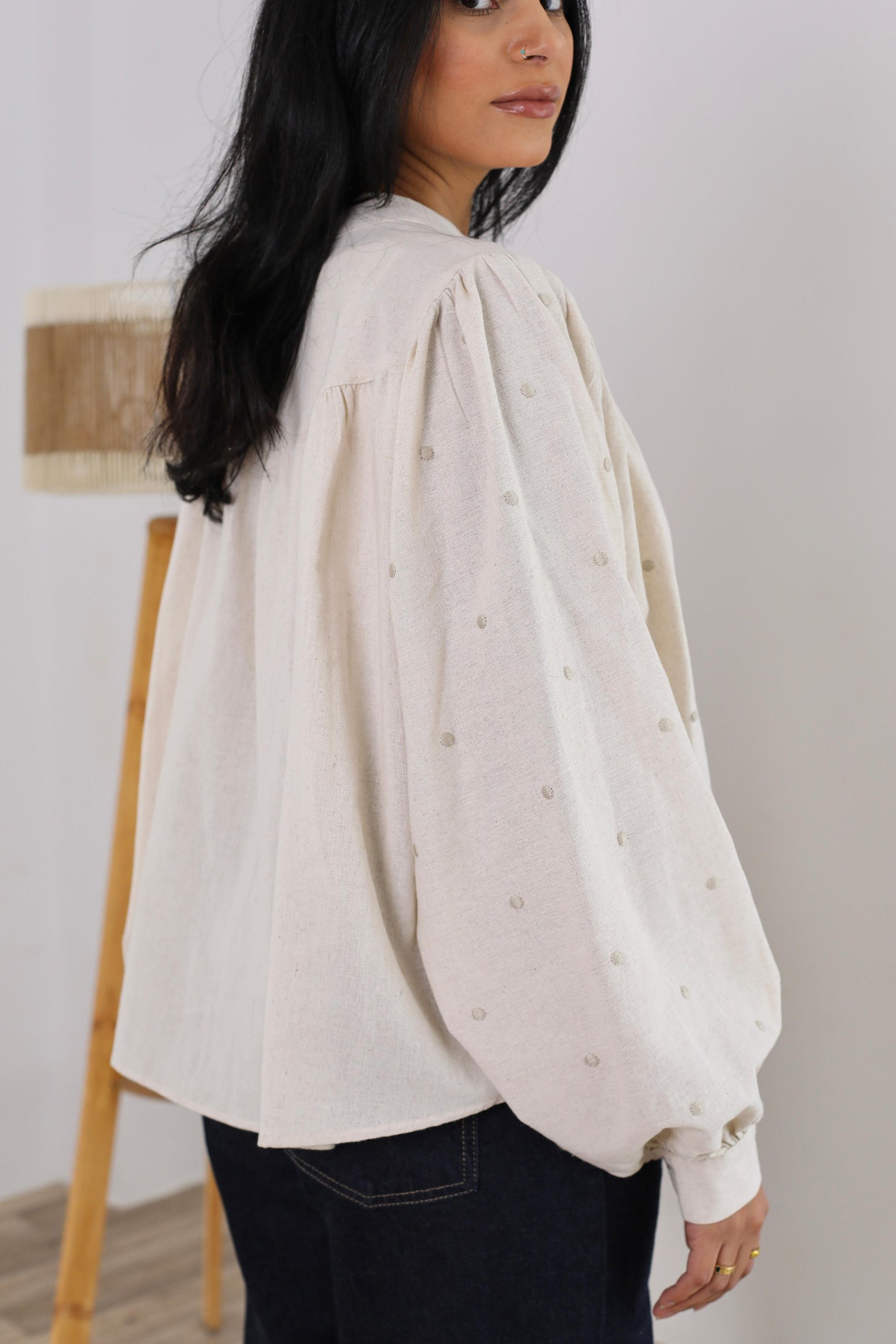 Elegant Button-Down Blouse with Subtle Dotted Detailing
