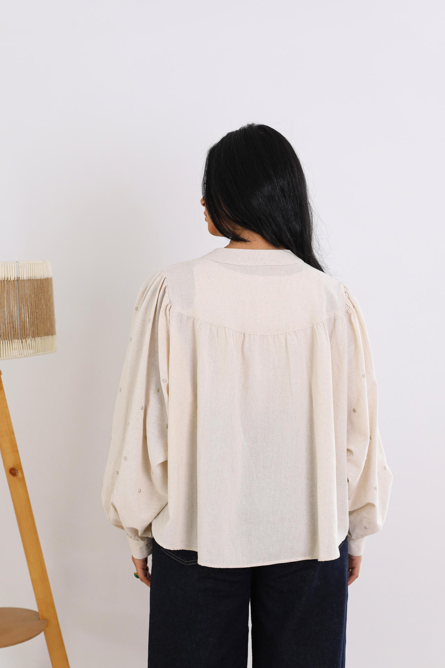 Elegant Button-Down Blouse with Subtle Dotted Detailing