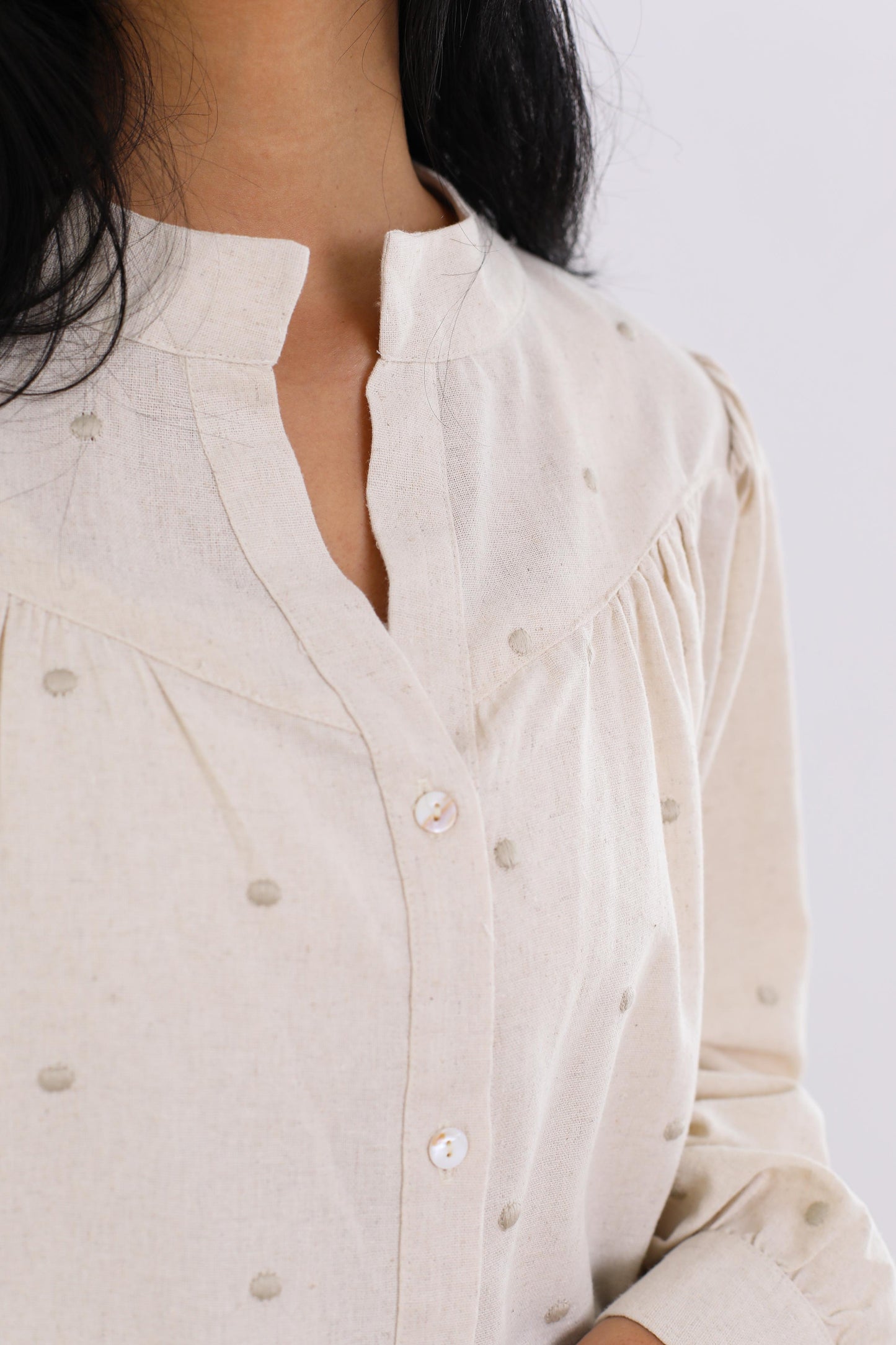 Elegant Button-Down Blouse with Subtle Dotted Detailing