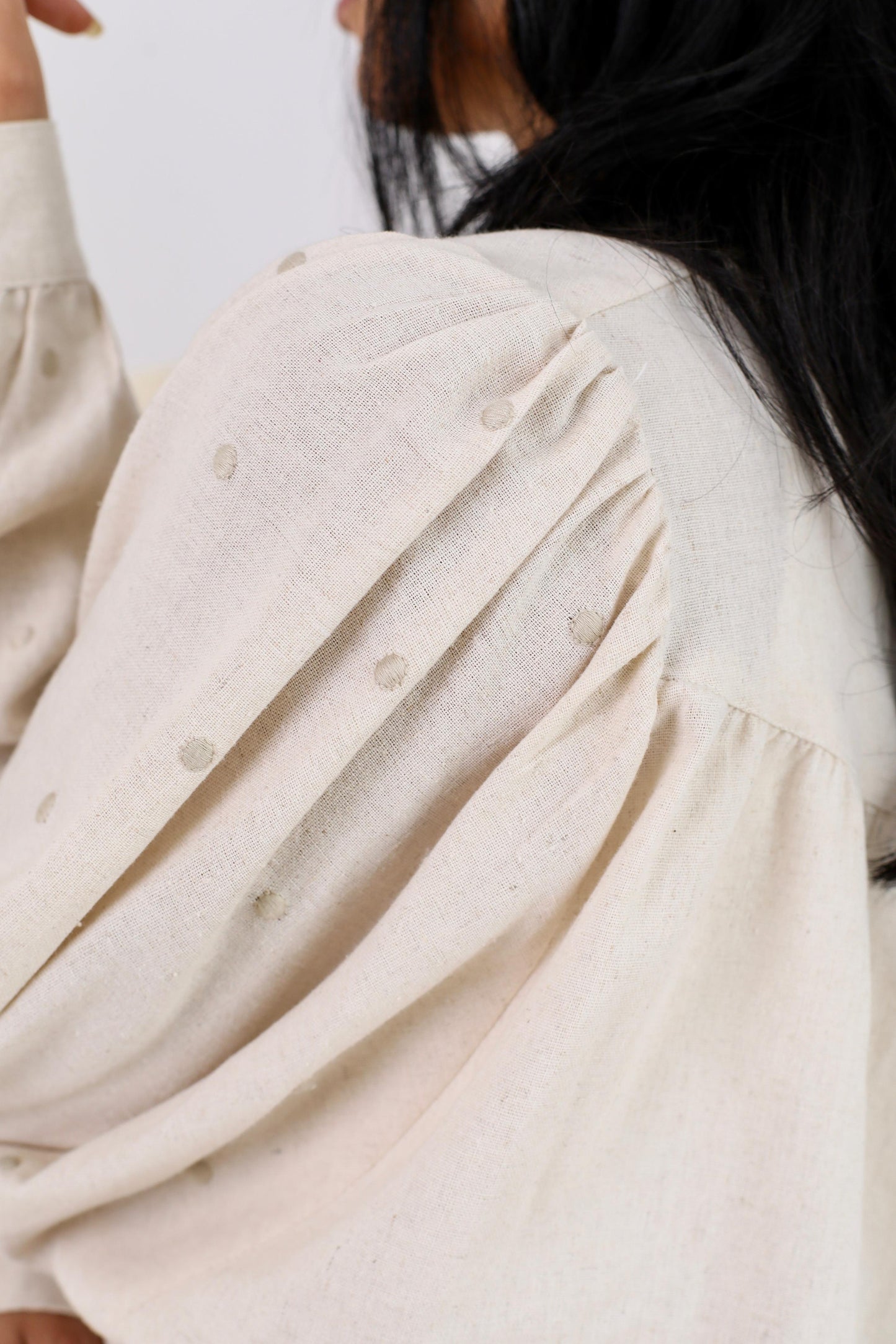 Elegant Button-Down Blouse with Subtle Dotted Detailing