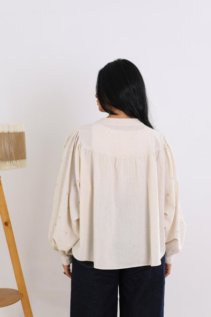 Elegant Button-Down Blouse with Subtle Dotted Detailing