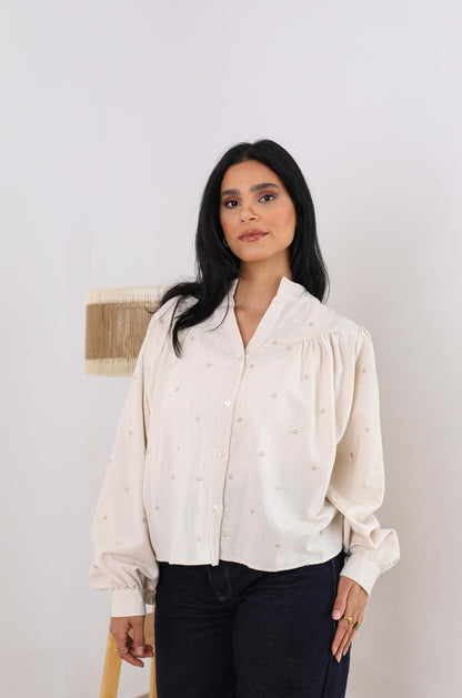 Elegant Button-Down Blouse with Subtle Dotted Detailing